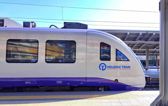 Photo of a Siemens Desiro Class 460 Electric Multiple Unit (EMU) train car, operated by Hellenic Train (FS Group), stands at the Athens railway station platform in Athens, Greece.
