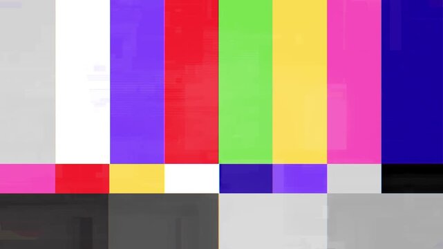 Vibrant color bars and grayscale test pattern, depicting a classic television broadcast signal, calibration screen, or an analog transmission error