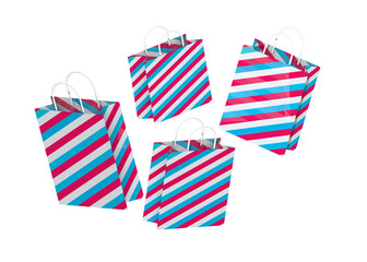 Obraz premium Colorful striped shopping bags 3D render isolated on transparent background. Bright retail paper bags with handles for sale, shopping, gift and holiday promotion concept.