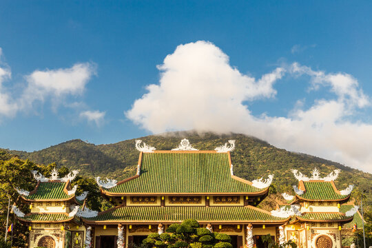 Linh Ung Pagoda with blue sky and mountains in background, Da Nang, Vietnam