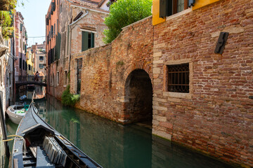 Venice canals with gondolas, scenic view, colorful buildings with traditional architecture, picturesque view © CoinUp