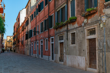 Venice street alley, typical architecture, colorful picturesque buildings