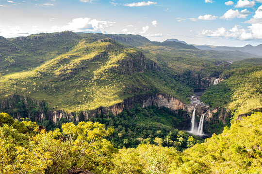 The wild beauty of Chapada dos Veadeiros reveals a landscape of ancient rocks, crystal-clear waterfalls, and endless Brazilian savanna stretching to the horizon.