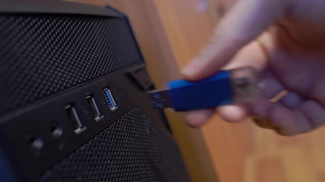 An office worker plugged a flash drive into a computers USB port