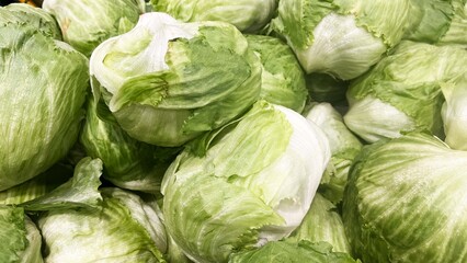 Fototapeta premium Fresh Lettuce Top View on Natural Background. Organic Leaf Vegetable, Healthy Food, Farm Fresh, Green Produce