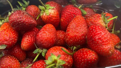 Close Up of Fresh Strawberries on Natural Background © SinemArt