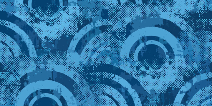 Abstract blue pattern featuring concentric circles and textured background