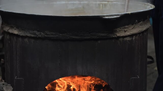 Traditional Sumalak Cooking in Large Cauldron. Navruz Spring Festival in Uzbekistan
