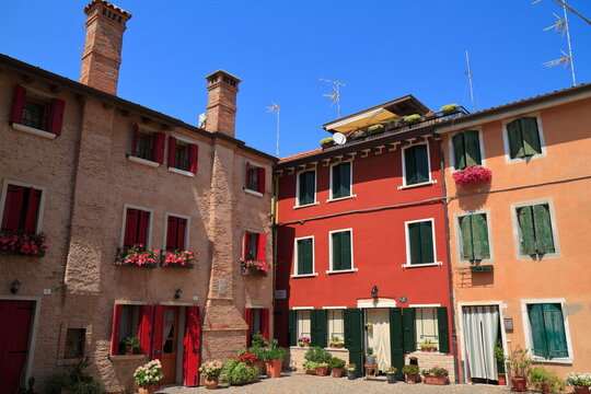 Colorful Old Houses Vibrant European Street Scene, Caorle, Italy