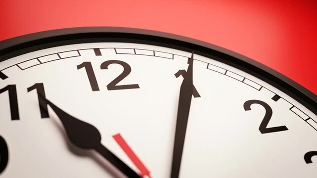 Close-up of clock face showing 1 o'clock on red background