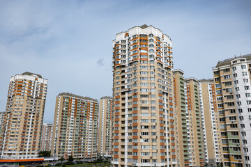 Fototapeta premium Modern high-rise apartment buildings forming part of a dense cityscape