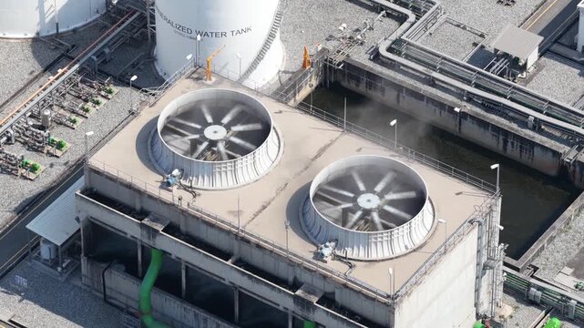 Industrial power plant cooling tower fans rotating