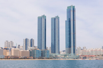 Fototapeta premium Busan Bay yacht boat cruise, Busan, South Korea, Yongho-dong, with Gwangan Diamond bridge, marina skyline and port harbor panorama, during boat excursion tour, Korean Strait, Haeundae river cruise