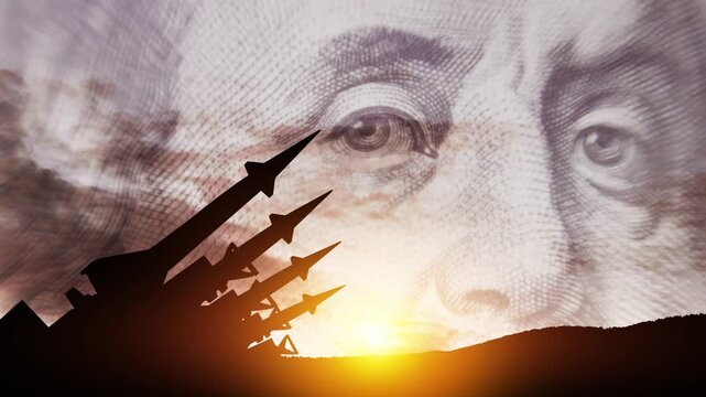 The missiles are aimed to the sky at sunset. The missiles on background of US dollar. Nuclear bomb, chemical weapons, missile defense, a system of salvo fire.