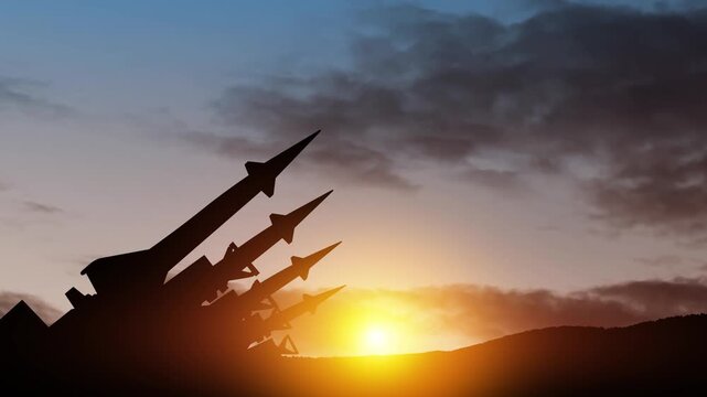 The missiles are aimed to the sky at sunset. Nuclear bomb, chemical weapons, missile defense, a system of salvo fire.