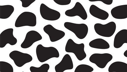 Fototapeta premium Cow print pattern with irregular black patches on a white background, creating a classic and rustic texture for design.