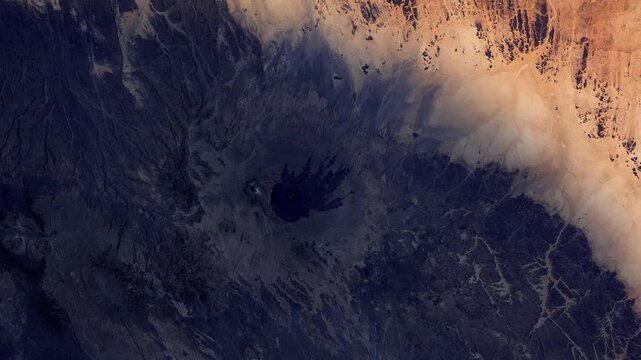 Rotating sunrise timelapse over Tousside Toussidel Volcano Chad satellite view from space based on Nasa imagery