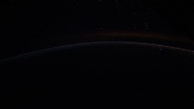 Earth night timelapse with lightning storms and curved horizon view from space satellite view based on Nasa imagery