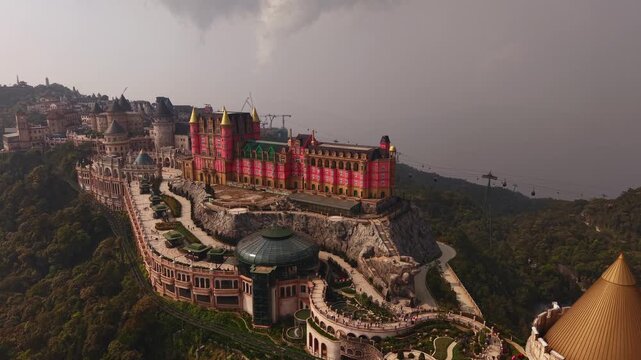Stunning sunset over ba na hills castle complex in Da nang Vietnam.