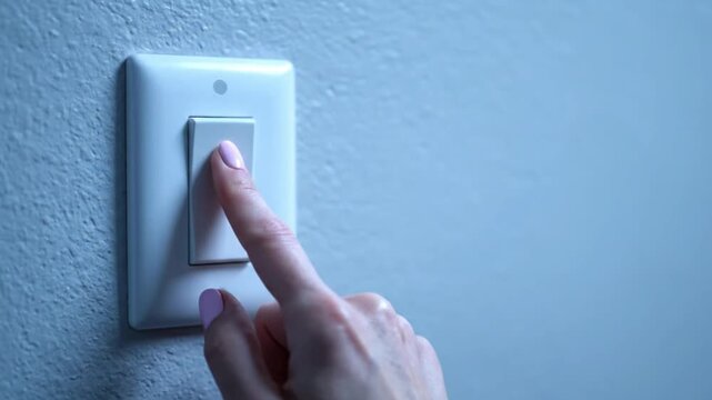 hand with light switch