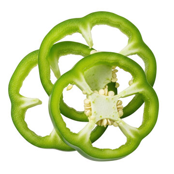 Green bell pepper slices with seeds, fresh organic capsicum rings isolated on white background, raw vegetable slices for cooking and food design