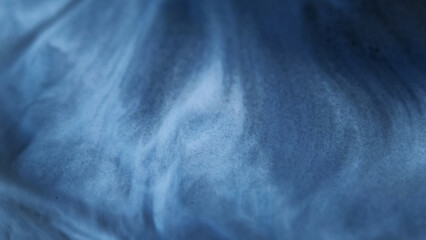 Defocused paint water. Marble liquid spill. Blue color mix splash pigment vibrant texture spreading...