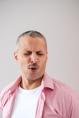 Man Making Face of Disgust or Dislike