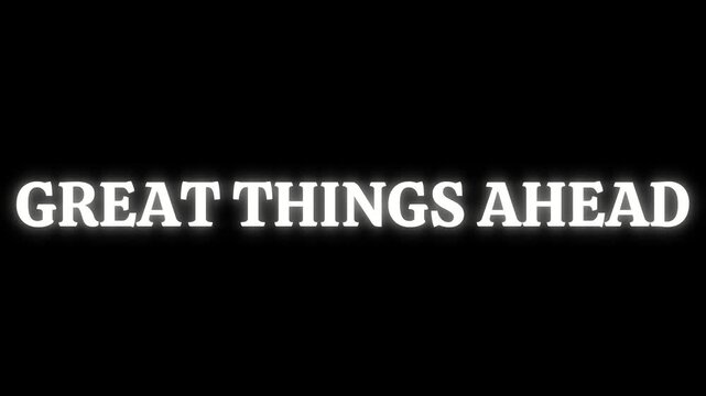 Glowing white text displaying the motivational phrase great things ahead radiates light against a stark black background suggesting future success and opportunity.
