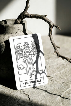 Exploring the meaning of temperance through a tarot card in a quiet space