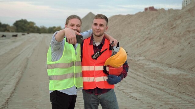 Professional workers make picture, working on site