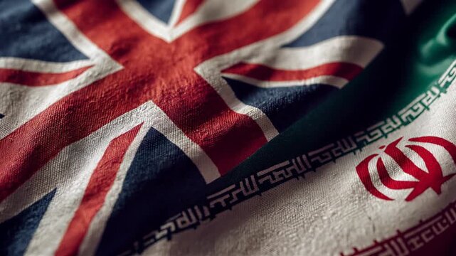 uk and iranian flag waving together