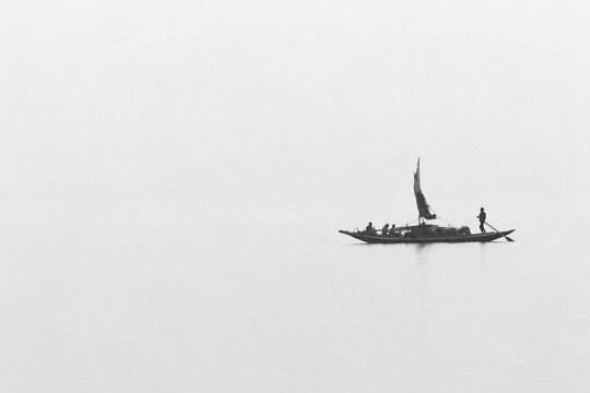 A highkey image of boats sailing at Sundarban tiger reserve, India