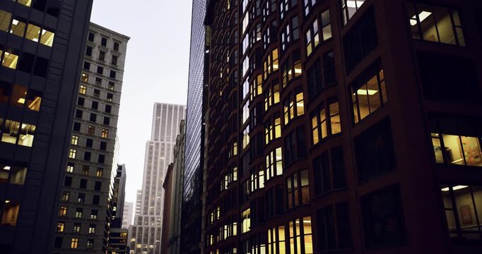 dawn light on reflective glass avenue, mirrored facades amplify vertical rhythm, narrow urban canyon with layered windows, crisp cool tones, ideal
