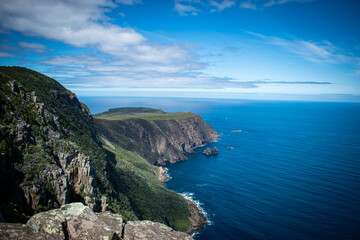 Fototapeta premium Australia, Cape Raoul is 14km return walk with stunning coastal views, seascapes and towering dolerite cliffs, columns and platforms. It is one of Tasmania's 60 Great Short Walks.
