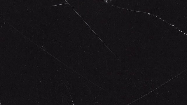 Abstract Black Background with White Scribbles and Paperclip.