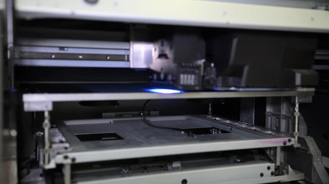 Souvenir printer in progress. The electromechanical pen and souvenir printing machine works by moving the print head