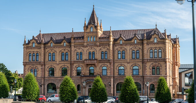 Varberg, Sweden - July 19 2024: Historic European bank building with ornate architecture and towers.
