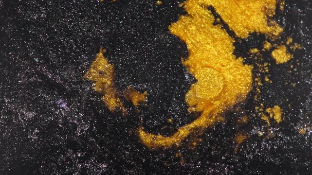 Abstract Gold and Black Glitter Texture With Metallic Paint Swirls and Shimmering Cosmic Feel