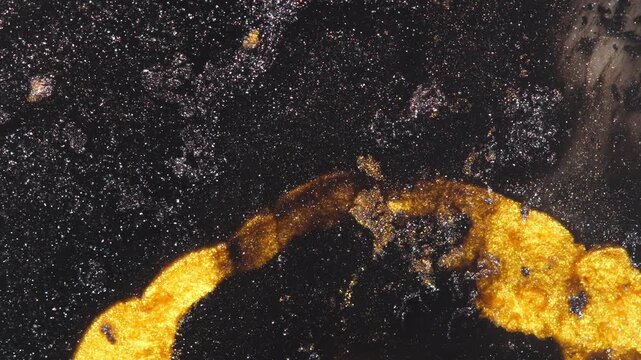 Abstract Black And Gold Texture With Glittering Gold Leaf Macro Detail And Sparkling Metallic Surface