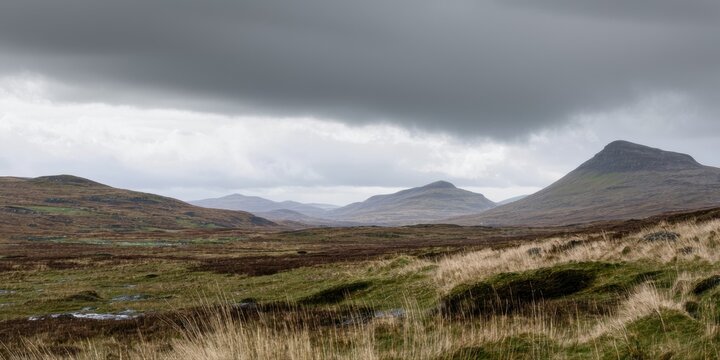 Remote landscape features rolling hills, moorland, cloudy sky. Wet terrain suggests damp climate, peaceful scenery.