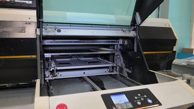 Souvenir printer in progress. The electromechanical pen and souvenir printing machine works by moving the print head