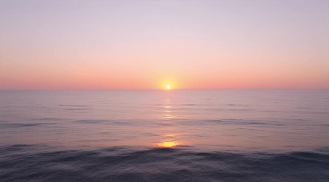 Serene Ocean Sunset with Pink and Lavender Sky and Gentle Waves