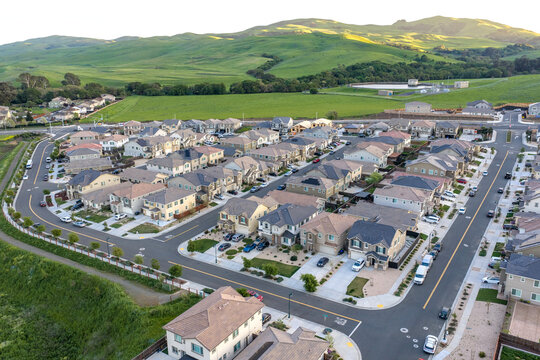 Drone Aerial View of Suburban Housing Development with New Construction Homes, Residential Real Estate Growth, Master Planned Community, and Housing Market Expansion
