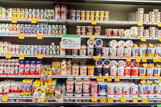 Villa de Alvarez, Colima, Mexico. March 6, 2026: Abundant Display of Diverse Yogurt Brands on Supermarket Shelf for Sale