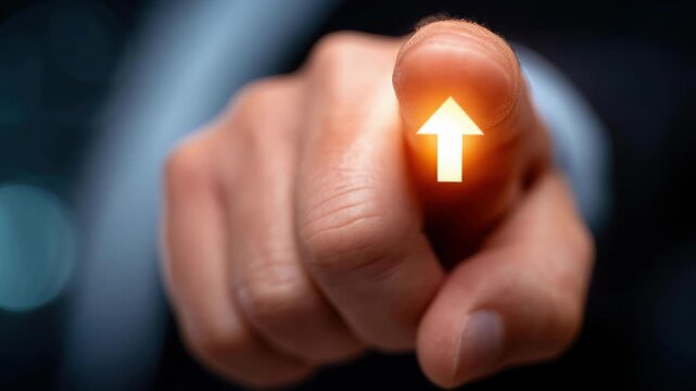 Point of Direction: A close-up shot of a hand pointing with a glowing arrow symbol, indicating guidance, direction, and the forward path ahead.