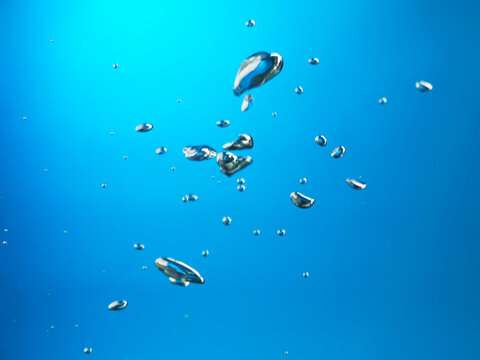 Oxygen Bubble in Blue Water artistic underwater closeup