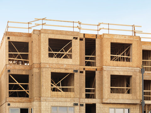 Construction Site Wooden frame residential condo houses being built
