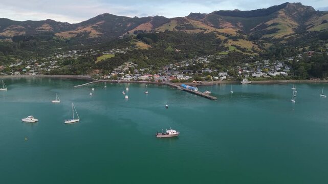 Akaroa town outside Christchurch drone aerial 4k
