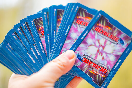 German Beyblade Battle Card Collection trading cards, strategize and enhance character cards with spinning tops, game statistics, Takara Tomy merchandise, collectible game cards, playful pop culture