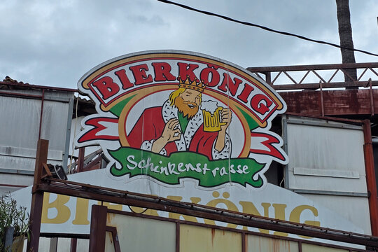PALMA, SPAIN - MARCH 10, 2026: Iconic Bierk&ouml;nig sign with cartoon king character at the Schinkenstrasse entrance in Platja de Palma, Mallorca, Spain